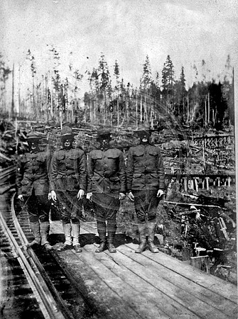 WW1 Soldiers standing amid logging operation Humboldt County