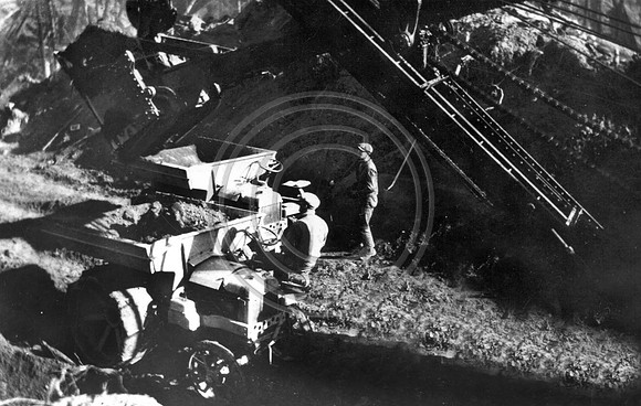 1936 building railroad in Cloney Gulch Iron mule operators are front Arnold Dahl Back Ivan Foster Shovel Operator Glen Thompson