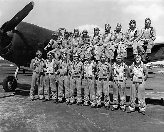 Navy fliers on wing of F-6 F Hellcat