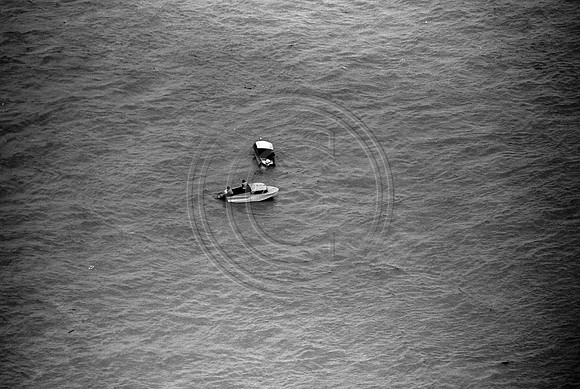 One boat rescueing another