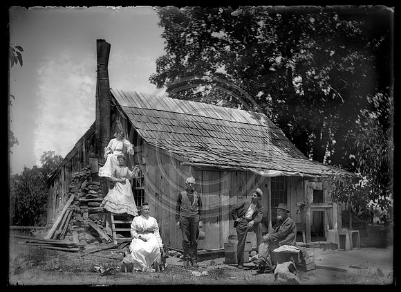 Pioneer Cabin with 3 women and 3 men and their dog SCANNED 4-3-2012 @2400 dpi  from 5x7 glass negative