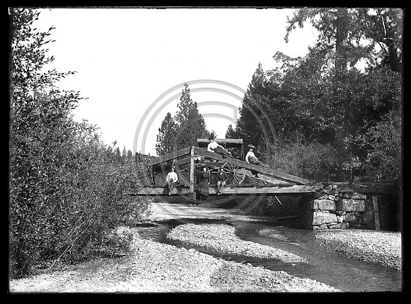 Victorian couples posing on a bridge Scanned 3-27-2012 from 5x7 glass neg.