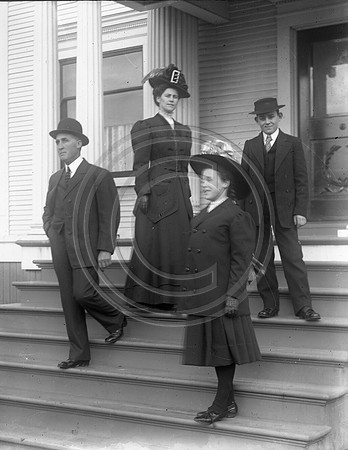 McIntyre family on steps of 7th and O home Fortuna