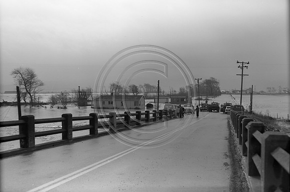 1960 Flood people gather at end of Fernbridge looking towards Ferndale