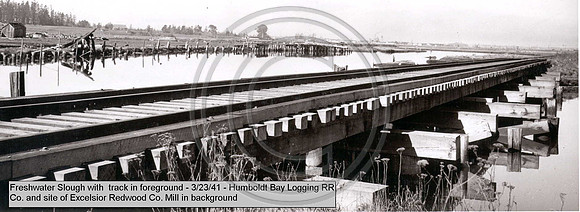March 23rd 1941 Freshwater Slough with track in foreground Humboldt Bay Logging RR Company and site of Excelsior Redwood Company mill in background