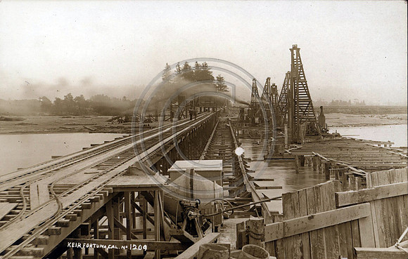 steam donkeys at work on the pilings