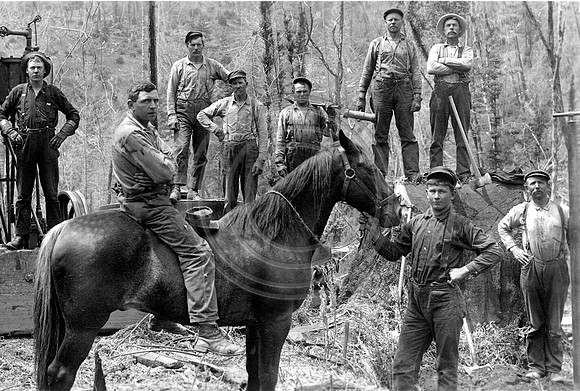 Loggers taking a break to pose for this photograph